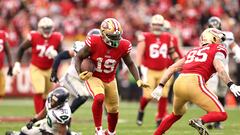 SANTA CLARA, CALIFORNIA - JANUARY 14: Deebo Samuel #19 of the San Francisco 49ers runs the ball against the Seattle Seahawks during the third quarter in the NFC Wild Card playoff game at Levi's Stadium on January 14, 2023 in Santa Clara, California.   Ezra Shaw/Getty Images/AFP (Photo by EZRA SHAW / GETTY IMAGES NORTH AMERICA / Getty Images via AFP)