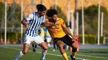 Jason, de albiazul, contra los Wolves