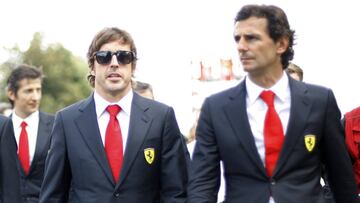 Ferrari Formula One drivers Fernando Alonso of Spain (C), compatriot Pedro de la Rosa (R) and Kimi Raikkonen of Finland, arrive for a memorial in Ayrton Senna's honour at the Imola race track, northern Italy May 1, 2014. A tribute event was held at