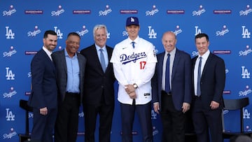 LOS ANGELES, CALIFORNIA - DECEMBER 14: (L-R) General Manager Brandon Gomes, Manager Dave Roberts, Owner and Chairman Mark Walter, Shohei Ohtani, President and CEO Stan Kasten, and President of Baseball Operations Andrew Friedman pose for a photo at Dodger Stadium on December 14, 2023 in Los Angeles, California.   Meg Oliphant/Getty Images/AFP (Photo by Meg Oliphant / GETTY IMAGES NORTH AMERICA / Getty Images via AFP)