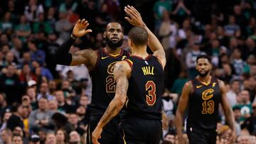 May 27, 2018; Boston, MA, USA; Cleveland Cavaliers forward LeBron James (23) and guard George Hill (3) high five after scoring against the Boston Celtics during the fourth quarter in game seven of the Eastern conference finals of the 2018 NBA Playoffs at TD Garden. Mandatory Credit: David Butler II-USA TODAY Sports