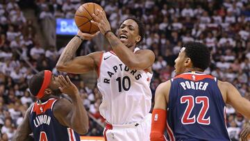 TORONTO, ON - APRIL 17: DeMar DeRozan #10 of the Toronto Raptors tries to get a shot off over Ty Lawson #4 of the Washington Wizards in Game Two of the Eastern Conference First Round in the 2018 NBA Play-offs at the Air Canada Centre on April 17, 2018 in Toronto, Ontario, Canada. The Raptors defeated the Wizards 130-119.   Claus Andersen/Getty Images/AFP
 == FOR NEWSPAPERS, INTERNET, TELCOS &amp; TELEVISION USE ONLY ==