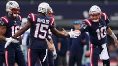FOXBOROUGH, MASSACHUSETTS - OCTOBER 17: Nelson Agholor #15 and Mac Jones #10 of the New England Patriots slap hands before a game against the Dallas Cowboys at Gillette Stadium on October 17, 2021 in Foxborough, Massachusetts.   Maddie Meyer/Getty Images/