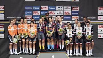 Second placed, Boels Dolmans Cycling Team of the Netherlands; winner Team Canyon SRAM Racing of Germany (C) and third placed Team Sunweb of Germany pose on the podium after the women&#039;s elite Team Time Trial (TTT) road race during the UCI Cycling Road World Championships on September 23, 2018 in Innsbruck, Austria. (Photo by Reinhard EISENBAUER / various sources / AFP) / Austria OUT
