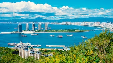 Sanya city, Hainan island. Aerial view of Phoenix Island from Luhuitou Park. Excellent tourism destination for summer vacation. Popular Chinese resort. Paradise island.