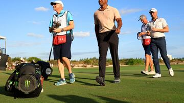 Tiger Woods of the United States walks off the 18th hole during the first round of the Hero World Challenge at Albany Golf Course