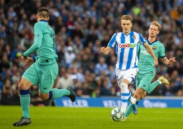 Odegaard in action against Barcelona