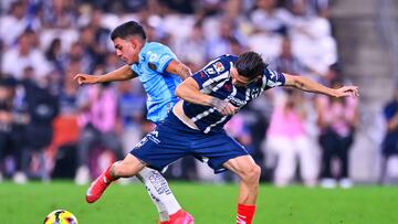 (L) of Pachuca fights for the ball with Gerrado Arteaga (R) of Monterrey during the Play-In round match between Monterrey and Pachuca as part of the Liga BBVA MX, Torneo Clausura 2025 at BBVA Bancomer Stadium on April 27, 2025 in Monterrey, Nuevo Leon, Mexico.