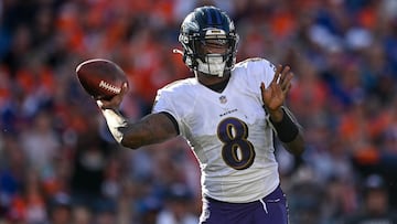 Lamar Jackson of the Baltimore Ravens passes in the third quarter of the game against the Denver Broncos. 
