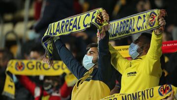 Villarreal fans wave flags during the UEFA Champions League, Group F match at the Estadio de la Ceramica in Villarreal, Spain. Picture date: Tuesday November 23, 2021. See PA Story SOCCER Man Utd. Photo credit should read: Isabel Infantes/PA Wire. RESTRIC