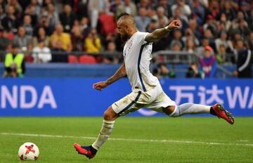 Chile's midfielder Arturo Vidal shoots the ball in the penalty shoot out during the 2017 Confederations Cup semi-final football match between Portugal and Chile at the Kazan Arena in Kazan on June 28, 2017.  Chile moves into the finals.