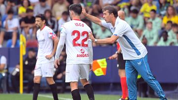 Isco, con Lopetegui durante un partido.