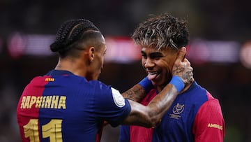 Soccer Football - Spanish Super Cup - Final - FC Barcelona v Real Madrid - King Abdullah Sports City, Jeddah, Saudi Arabia - January 12, 2025 FC Barcelona's Lamine Yamal celebrates with Raphinha after scoring their first goal REUTERS/Pedro Nunes