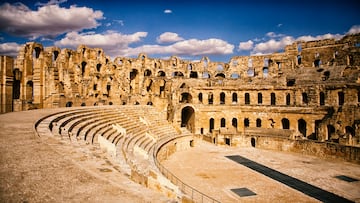 The impressive ruins of the largest colosseum in North Africa, a huge Roman amphitheater in the small village of El Jem, Tunisia. UNESCO World Heritage Site