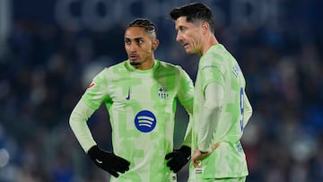 GETAFE, SPAIN - JANUARY 18: Robert Lewandowski and Raphael Dias "Raphinha" of FC Barcelona looks on during the LaLiga match between Getafe CF and FC Barcelona at Coliseum Alfonso Perez on January 18, 2025 in Getafe, Spain. (Photo by Diego Souto/Getty Images)