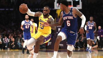 LOS ANGELES, CALIFORNIA - JANUARY 07: Elfrid Payton #6 of the New York Knicks defends against the dribble of LeBron James #23 of the Los Angeles Lakers during the second half of a game at Staples Center on January 07, 2020 in Los Angeles, California. NOTE TO USER: User expressly acknowledges and agrees that, by downloading and/or using this photograph, user is consenting to the terms and conditions of the Getty Images License Agreement Sean M. Haffey/Getty Images/AFP
== FOR NEWSPAPERS, INTERNET, TELCOS & TELEVISION USE ONLY ==