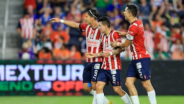 Sep 21, 2022; Cincinnati, OH, USA;  Club Deportivo Guadalajara midfielder Pavel Perez (middle) celebrates with teammates, forward Angel Zaldivar (9), and midfielder Jesus Molina (5) after scoring a goal against FC Cincinnati in the first half at TQL Stadium. Mandatory Credit: Aaron Doster-USA TODAY Sports