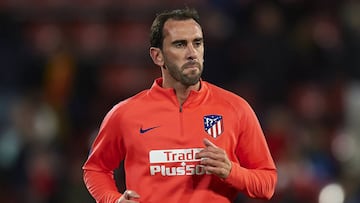 Godín antes de iniciar un partido.