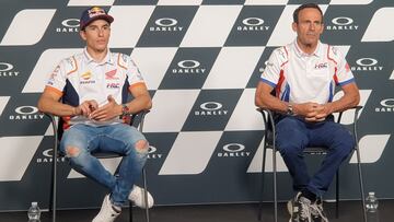 Marc Márquez y Alberto Puig.