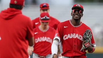 SAN JUAN, PUERTO RICO - MARCH 11: Denzel Clarke #1 of Team Canada celebrates a 7-2 victory against the Team Cuba after the game during the 2026 World Baseball Classic at Hiram Bithorn Stadium on March 11, 2026 in San Juan, Puerto Rico. Al Bello/Getty Images/AFP (Photo by AL BELLO / GETTY IMAGES NORTH AMERICA / Getty Images via AFP)