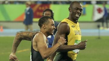 Bolt junto a De Grasse.