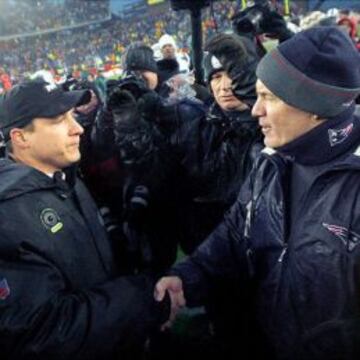 Eric Mangini y Bill Belichick.