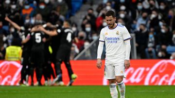 (FILES) In this file photo taken on January 23, 2022 Real Madrid's Belgian forward Eden Hazard (R) reacts as Elche's players (L) celebrate after scoring a goal during the Spanish league football match between Real Madrid CF and Elche CF at the Santiago Bernabeu stadium in Madrid. - Eden Hazard has undergone another operation on his troublesome right ankle, Real Madrid confirmed on March 29, 2022. (Photo by PIERRE-PHILIPPE MARCOU / AFP)