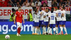 Soccer Football - Euro 2024 - Group D - Austria v France - Dusseldorf Arena, Dusseldorf, Germany - June 17, 2024 France's Kylian Mbappe and teammates celebrate their first goal, an own goal scored by Austria's Maximilian Wober REUTERS/Kacper Pempel