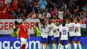Soccer Football - Euro 2024 - Group D - Austria v France - Dusseldorf Arena, Dusseldorf, Germany - June 17, 2024 France's Kylian Mbappe and teammates celebrate their first goal, an own goal scored by Austria's Maximilian Wober REUTERS/Kacper Pempel