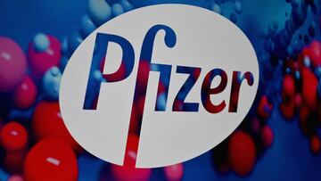 (FILES) In this file photo the Pfizer logo is seen at the Pfizer Inc. headquarters on December 9, 2020 in New York City. - The administration of President Joe Biden is buying 500 million doses of the Pfizer-BioNTech Covid-19 vaccine to distribute among other countries, US media reported on June 9, 2021 citing people familiar with the matter. Biden will make the formal announcement at the G-7 meeting in Britain this week, the Washington Post and New York Times said. (Photo by Angela Weiss / AFP)