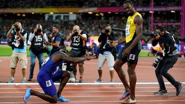 Justin Gatlin of the U.S. kneels down in front of Usain Bolt of Jamaica after the final of the Men&#039;s 100 Metres final during the World Athletics Championships at London Stadium, London, Britain, August 5, 2017. REUTERS/Phil Noble/File Photo  SEARCH &quot;POY SPORT&quot; FOR THIS STORY. SEARCH &quot;REUTERS POY&quot; FOR ALL BEST OF 2017 PACKAGES.    TPX IMAGES OF THE DAY