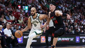 MIAMI, FLORIDA - FEBRUARY 11: Derrick White #9 of the Boston Celtics drives against Tyler Herro #14 of the Miami Heat during the second quarter of the game at Kaseya Center on February 11, 2024 in Miami, Florida. NOTE TO USER: User expressly acknowledges and agrees that, by downloading and or using this photograph, User is consenting to the terms and conditions of the Getty Images License Agreement. Megan Briggs/Getty Images/AFP (Photo by Megan Briggs / GETTY IMAGES NORTH AMERICA / Getty Images via AFP)