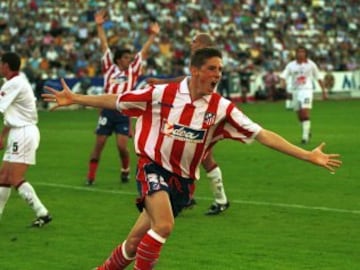 Torres celebrates a goal in his debut season with Atletico's first team.