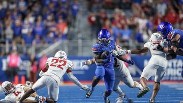 BOISE, ID - SEPTEMBER 28: Running back Ashton Jeanty #2 of the Boise State Broncos runs through the defense during the second half against the Washington State Cougars at Albertsons Stadium on September 28, 2024 in Boise, Idaho. Boise State won the game 45-24. Loren Orr/Getty Images/AFP (Photo by Loren Orr / GETTY IMAGES NORTH AMERICA / Getty Images via AFP)