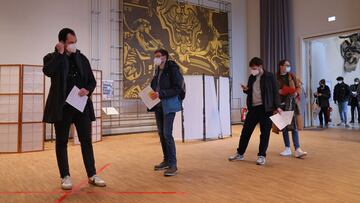 BERLIN, GERMANY - JANUARY 18: People arrive at the Humboldt Forum museum to be vaccinated against Covid-19 during the Omicron wave of the coronavirus pandemic on January 18, 2022 in Berlin, Germany. The museum has launched a three-day vaccination drive for anyone in Berlin seeking a shot. Approximately 73% of the population in Germany is now fully vaccinated. Meanwhile Omicron has fuelled record-breaking rates of new infections since the beginning of the year. (Photo by Sean Gallup/Getty Images)