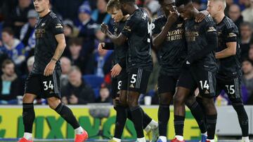 BRIGHTON, ENGLAND - DECEMBER 31: Martin Odegaard of Arsenal celebrates with teammates after scoring the team's second goal during the Premier League match between Brighton & Hove Albion and Arsenal FC at American Express Community Stadium on December 31, 2022 in Brighton, England. (Photo by Steve Bardens/Getty Images)