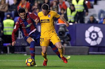 Levante's José Ángel Campaña tussles with Atlético Madrid's Kevin Gameiro.