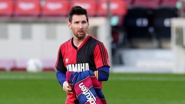 Soccer Football - La Liga Santander - FC Barcelona v Osasuna - Camp Nou, Barcelona, Spain - November 29, 2020 FC Barcelona&#039;s Lionel Messi celebrates scoring their fourth goal wearing a Newell&#039;s Old Boys shirt in reference to former player Diego 