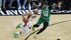 Gabe Vincent #2 of the Miami Heat drives against Marcus Smart #36 of the Boston Celtics