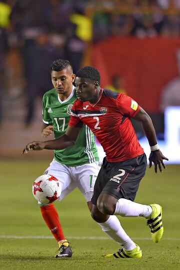 Action photo of action during the match Mexico vs Trinidad and Tobago, corresponding to the Final Hexagonal during the CONCACAF Qualifying rounds for the 2018 FIFA World Cup Russia, at Alfonso Lastras Stadium
Foto de accion durante el partido Mexico vs Trinidad y Tobago, correspondiente al Hexagonal Final durante las Eliminatorias de la CONCACAF rumbo a la Copa Mundial de la FIFA Rusia 2018, en el Estadio Alfonso Lastras, en la foto: (i-d), Jesus Manuel Corna de Mexico y 2 Kareem Moses de Trinidad
06/10/2017/MEXSPORT/Isaac Ortiz.
