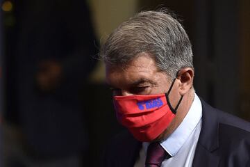 Barcelona president Joan Laporta arrives at Lionel Messi's farewell press conference on Sunday.