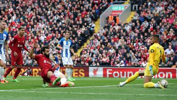 Soccer Football - Premier League - Liverpool v Brighton & Hove Albion - Anfield, Liverpool, Britain - October 1, 2022 Brighton & Hove Albion's Robert Sanchez makes a save from Liverpool's Mohamed Salah REUTERS/Phil Noble EDITORIAL USE ONLY. No use with unauthorized audio, video, data, fixture lists, club/league logos or 'live' services. Online in-match use limited to 75 images, no video emulation. No use in betting, games or single club /league/player publications.  Please contact your account representative for further details.