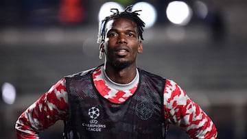 Manchester United's France's midfielder Paul Pogba warms up ahead of the UEFA Champions League group F football match between Atalanta and Manchester United at the Azzurri d'Italia stadium, in Bergamo, on November 2, 2021. (Photo by Marco B