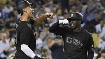 LOS ANGELES, CA - AUGUST 23: Aaron Judge #99 of the New York Yankees congratulates Didi Gregorius #18 after he hit a grand slam home run against Hyun-Jin Ryu #99 of the Los Angeles Dodgers in the fifth inning at Dodger Stadium on August 23, 2019 in Los An