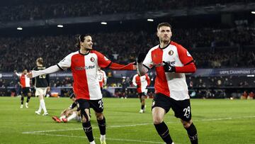 Feyenoord's Mexican forward #29 Santiago Gimenez (R) celebrates with Feyenoord's Algerian forward #23 Anis Hadj-Moussa after scoring his team's fourth goal during the UEFA Champions League, league phase football match between Feyenoord and Sparta Praha at the Stadion Feijenoord 'De Kuip' in Rotterdam, on December 11, 2024. (Photo by MAURICE VAN STEEN / ANP / AFP) / Netherlands OUT