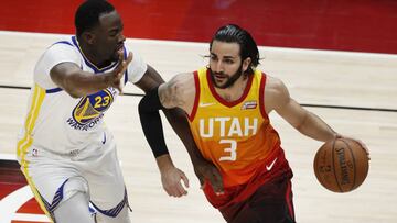 GFX07. SALT LAKE CITY (ESTADOS UNIDOS), 30/01/2018.- El jugador español Ricky Rubio (d) de los Utah Jazz en acción ante Draymond Green (i) de los Golden State Warriors durante el partido de la NBA entre los Utah Jazz y los Golden State Warri