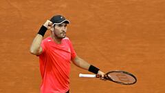 Serbia's Dusan Lajovic reacts during his 2023 ATP Tour Madrid Open tennis tournament singles match against Canada's Felix Auger-Aliassime at the Caja Magica in Madrid on April 29, 2023. (Photo by OSCAR DEL POZO / AFP)