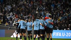 Players of Uruguay celebrate after defeating Italy and winning the Argentina 2023 U-20 World Cup final match between Uruguay and Italy at the Estadio Unico Diego Armando Maradona stadium in La Plata, Argentina, on June 11, 2023. (Photo by Luis ROBAYO / AFP)