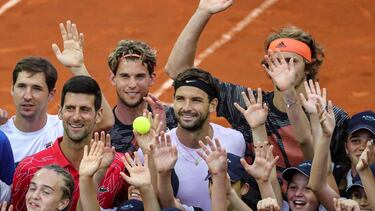 Bulgaria's Grigor Dimitrov, Serbia's Novak Djokovic, Dusan Lajovic, Austria's Dominic Thiem, Germany's Alexander Zverev pose for a photo with the ballkids during Adria Tour at Novak Tennis Centre in Belgrade, Serbia, June 12, 2020. Picture taken June 12,