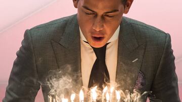 MUNICH, GERMANY - JULY 12: James Rodriguez of FC Bayern Muenchen blows out candles on a birthday cake after a press conference at Allianz Arena on July 12, 2017 in Munich, Germany. (Photo by Sebastian Widmann/Bongarts/Getty Images)